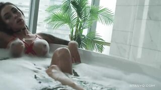Big Boobed russian sexy Megan posing from the bathtub