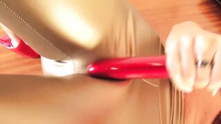 Time for an orgasm? All alone with tight gold pants and a powerful red toy