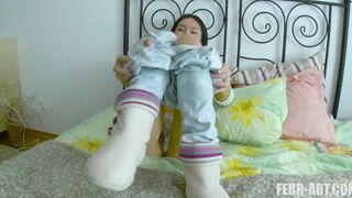Oriental women booty trained by long anal plug to got ready for sex.