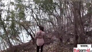 Amateur Thai teens Cherry sucking off a long white cock outdoors