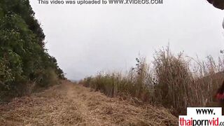 Amateur Thai teenagers Cherry nailed by a huge white penis from behind outdoors