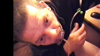 bi-curious mark wright swollows a 180 ml of his own piss threw a private piss tube