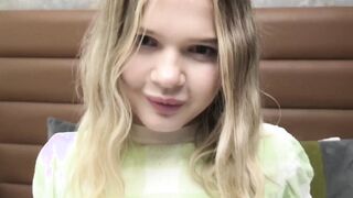 This petite teen with gorgeous green eyes sucks a fat dick