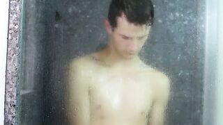 Sporty and horny twink Jessie getting steamy in the shower