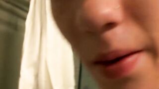Skinny twink plays with his dick in the bathroom solo