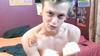 Inked twink strokes his cock and cums in solo homemade video