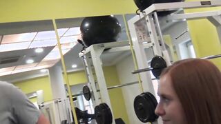 Redhead fucks a guy at the gym in front of boyfriends eyes