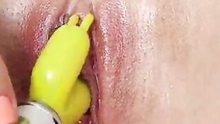 Shaved pussy masturbates