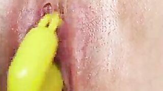 Shaved pussy masturbates