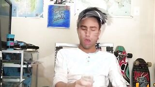 Tattooed Latino twink tugging and wanking his big fat cock