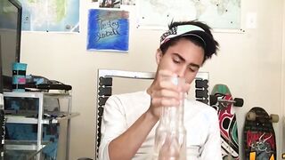 Tattooed Latino twink tugging and wanking his big fat cock