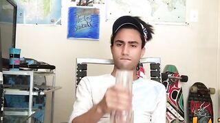 Tattooed Latino twink tugging and wanking his big fat cock