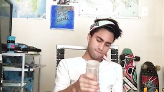 Tattooed Latino twink tugging and wanking his big fat cock