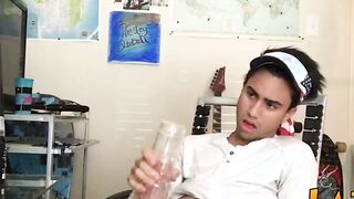 Tattooed Latino twink tugging and wanking his big fat cock