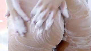 American Goddess Kagney Linn Karter peels off her towel and steps into the shower. She