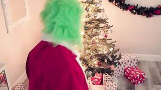 Cindy Lou Who and her adopted sis, Sister Who are sleeping peacefully as the Grinch sneaks in to steal their