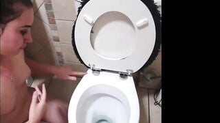 Pigtailed 19 year old blows penis after being pissed on and licking the WC clean | face spitting and slapping