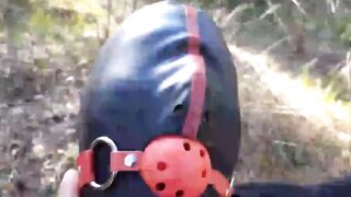 Bound to a tree on a beauty outfit, masked and outdoors deep throat with no mercy