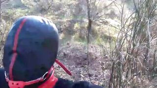 Bound to a tree on a beauty outfit, masked and outdoors deep throat with no mercy