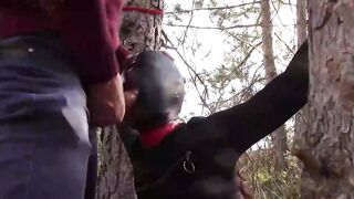 Bound to a tree on a beauty outfit, masked and outdoors deep throat with no mercy