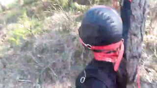 Bound to a tree on a beauty outfit, masked and outdoors deep throat with no mercy
