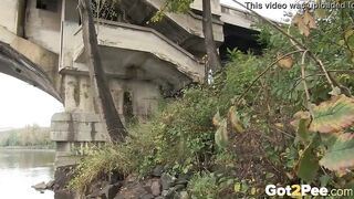 Raven Haired bimbos Pees Near The River
