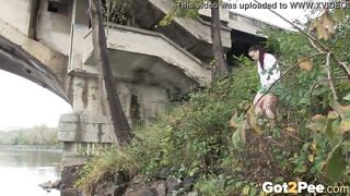 Raven Haired bimbos Pees Near The River