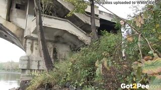 Raven Haired bimbos Pees Near The River