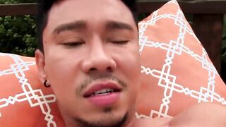 Inked Asian man strokes his massive cock solo