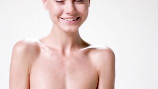 Skinny teen Jane F bounces on ball showcasing her firm tits