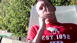Smoker twink Ryan plays with his ass while stroking his cock