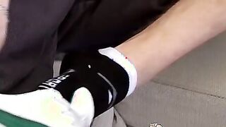Gay twink strokes his erect cock over sight of his own feet