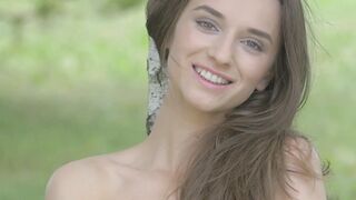 Adorable brunette Gloria Sol shows her natural tits outdoors
