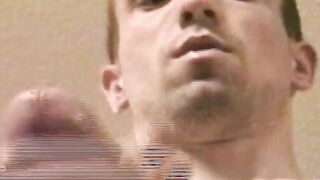 Slender stud spills load after stroking big dick