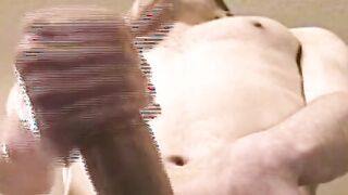 Slender stud spills load after stroking big dick