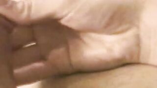 Slender stud spills load after stroking big dick