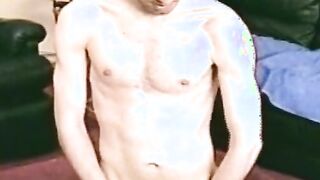 Slender stud spills load after stroking big dick