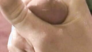 Slender stud spills load after stroking big dick