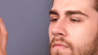 Gay jock Andrew plays on phone in solo masturbation session