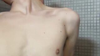 Sexy twink Trey Bentley deepthroating hard cock in bathroom