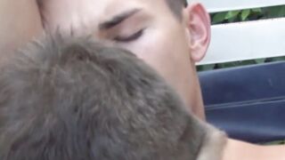 Attractive Evan Heart sucks dicks in outdoor threesome