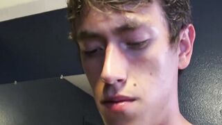 Good looking college twink rubs his big dick and cums solo