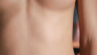 Seductive blonde beauty plays around in slow motion