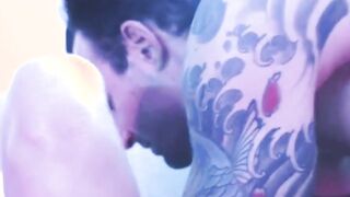 sexy blonde deepthroats a big dick in blue light