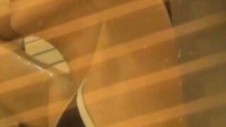 Young Japanese amateurs flash swimsuits for voyeur