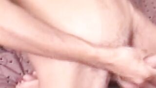 Hung guy tugs his hard hairy dick until spraying a big load