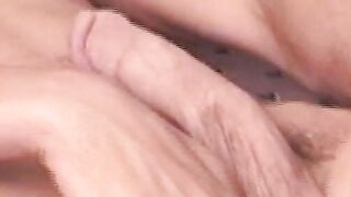 Hung guy tugs his hard hairy dick until spraying a big load