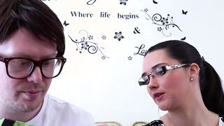 Nerdy gamer sucked skillfully by a cute babe with glasses