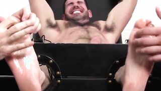 Big muscled Billy laughs hard while tickled on strap chair