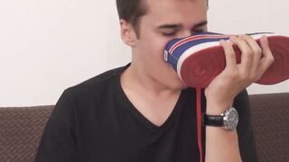 Perverted twink licks his feet and strokes his thick cock